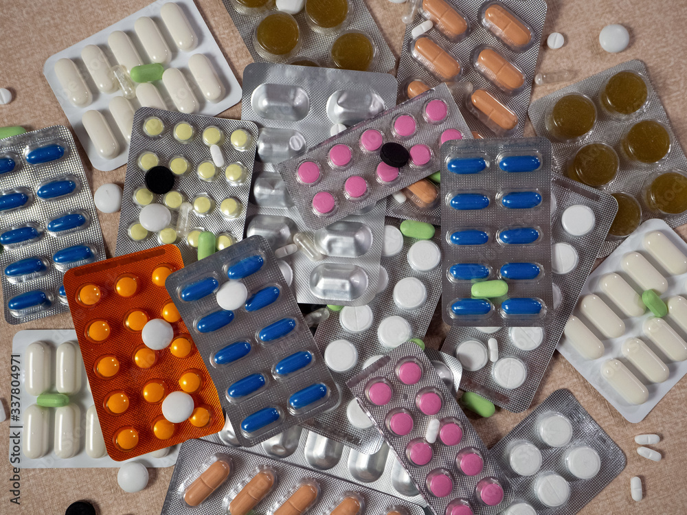 Medicines for various diseases in packs and individually. Background with medical supplies for pharmacies, industry and hospitals. Medicines for various diseases in packs and individually. Background with medical supplies for pharmacies, industry and hospitals.