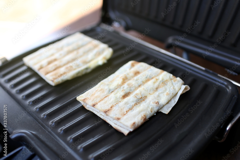 Morning tomorrow is cooked on an electric grill at home in the kitchen. Grilled Diet Vegetarian Food Morning tomorrow is cooked on an electric grill at home in the kitchen. Grilled Diet Vegetarian Food