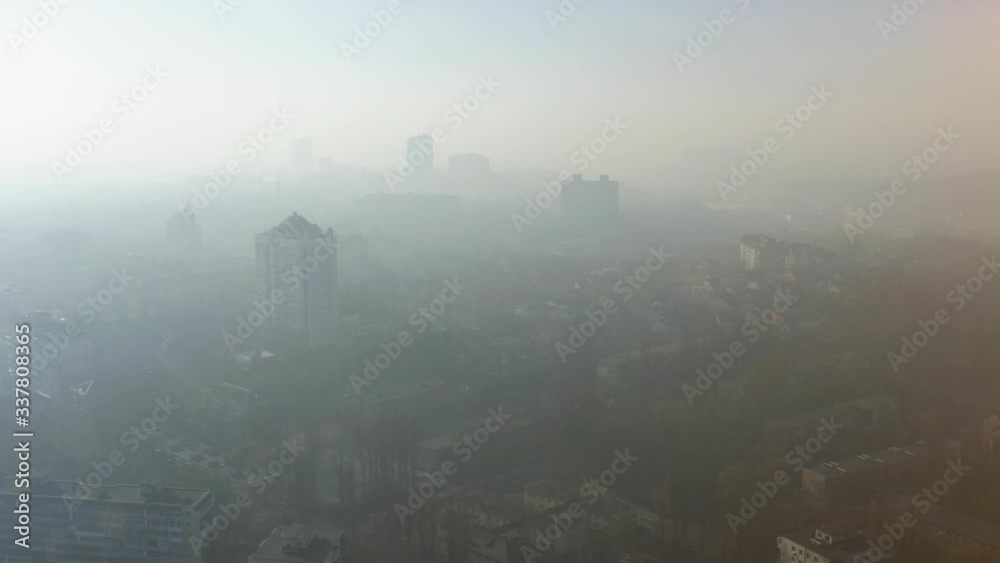 Aerial view of a dense smog or fog hanging over the city. Air environmental pollution concept 4k Aerial view of a dense smog or fog hanging over the city. Air environmental pollution concept 4k