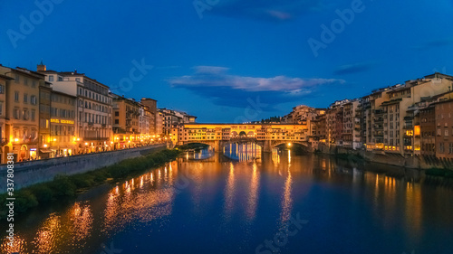 Night view on Ponte Vecchio in Florence Italy © MKozloff
