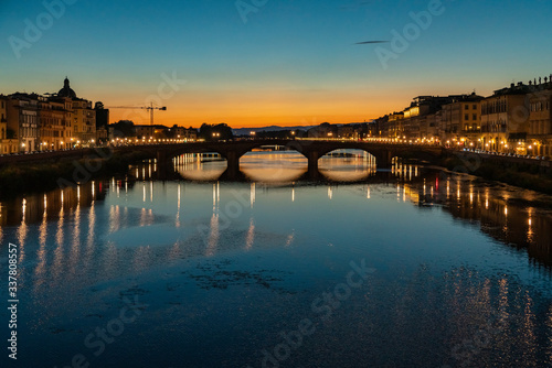 Wide angle night view of Ponte alla Carraia in Florence, Italy © MKozloff