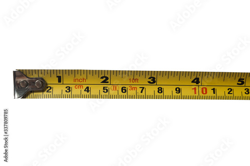 yellow flexometer tape in centimeters and inches