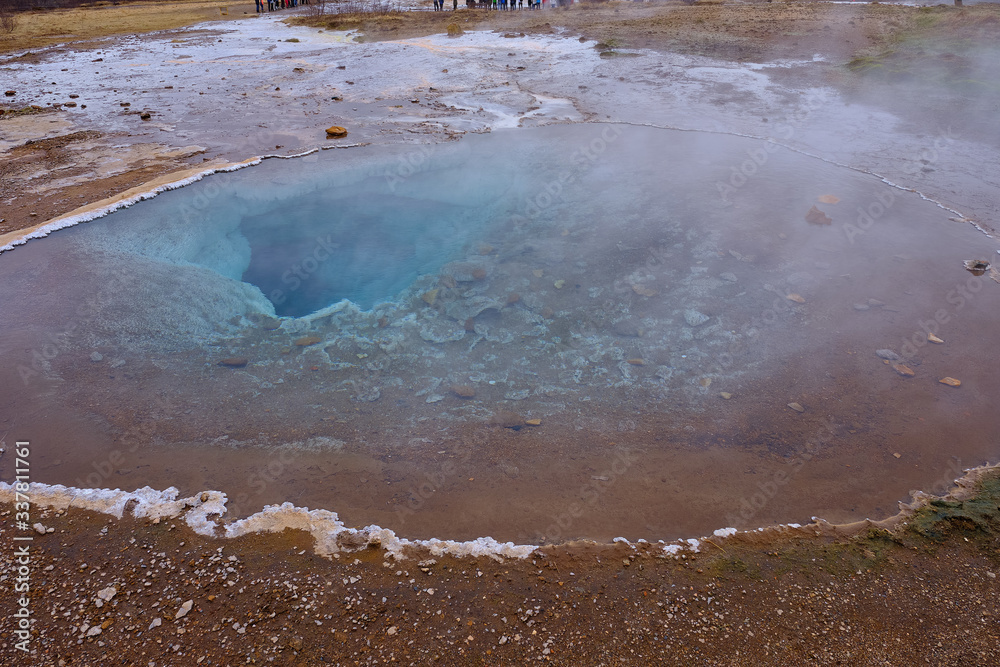 The Thermal vents located all around the Stokkur Geyser area in Iceland with the deep blue vents going deep underground The Thermal vents located all around the Stokkur Geyser area in Iceland with the deep blue vents going deep underground