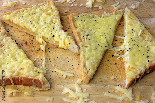 Bilde på lerret Melted cheddar cheese on toast.