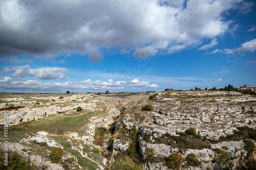 View of the park of the Rupestrian Churches of Gravina in Puglia with houses in caves and hypogeum. Apulia, Italy