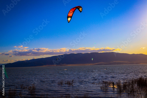 kitesurfing in Utah Lake at sunset