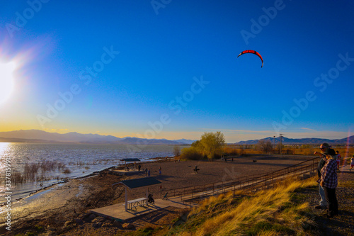 kitesurfing in Utah Lake at sunset