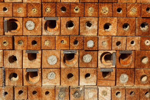 Detail of bee house. DIY hive for mason bees and insect. Bee hotel in garden.