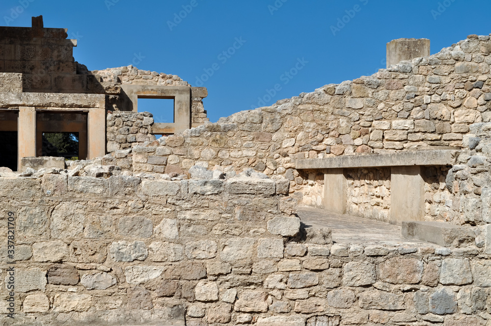 Remains of the stone walls of the ancient city of Knossos, Crete.