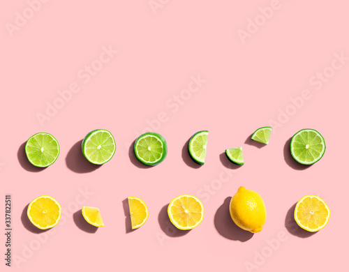 Fresh lemons and limes overhead view - flat lay