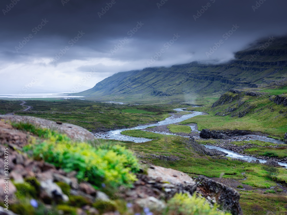 Landscape in Iceland. It's a famous place in Iceland. A mountain valley and clouds. Natural landscape in summer. Travel - image