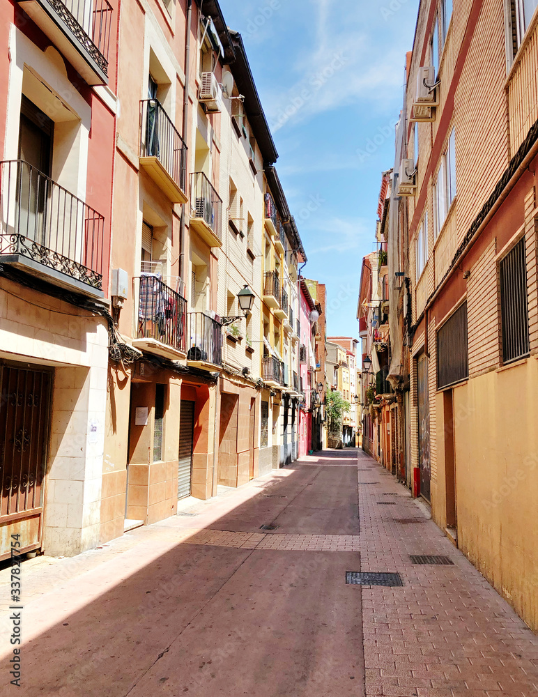 Fototapeta premium A street of Zaragoza in Spain, in a sunny day with blue sky