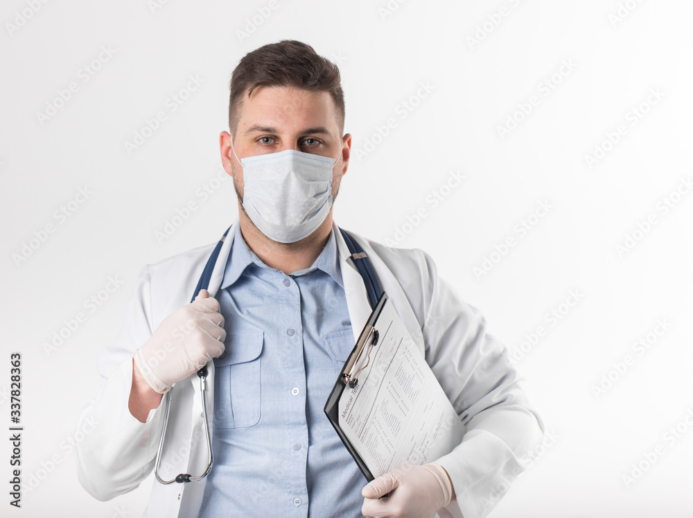 European doctor with stethoscope and mask check patient blood test European doctor with stethoscope and mask check patient blood test