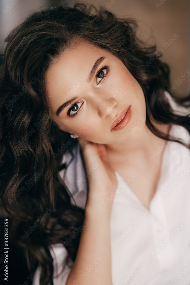 Portrait of beautiful young brunette girl with makeup Portrait of beautiful young brunette girl with makeup