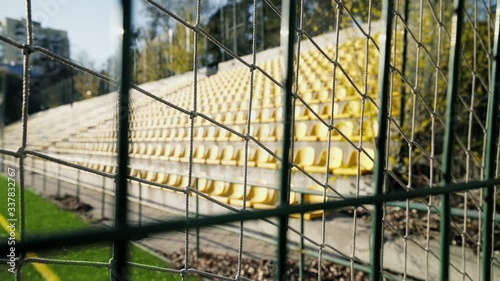 The stadium is fenced with an iron fence. World Cup and European Football Championship canceled. Cancellation of matches due to the coronavirus pandemic, quarantine. Access is closed. photo