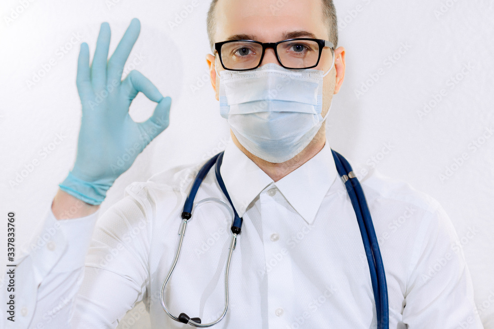 a doctor in a mask, glasses and gloves. stop coronovirus, observe quarantine, self-isolation, does analyzes a doctor in a mask, glasses and gloves. stop coronovirus, observe quarantine, self-isolation, does analyzes