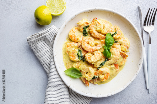 Shrimps in cream sauce with Coconut milk on a plate  top view or view from above  flat lay