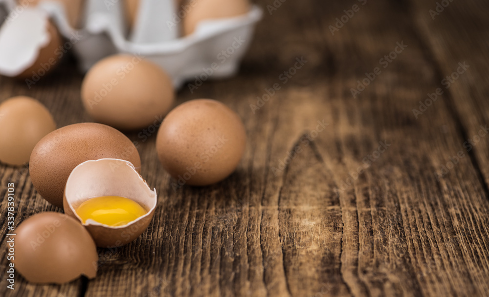 Raw Eggs on an old wooden table (selective focus) Raw Eggs on an old wooden table (selective focus)