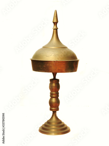 A manufactured bell metal product called Xorai is one of the traditional symbols of Assam, India. It is considered as an article of great respect by the people of Assam. It is used in felicitations. photo