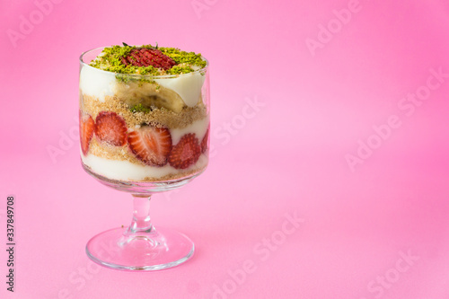 magnolia dessert in glass and pink background