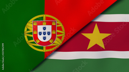 The flags of Portugal and Suriname. News, reportage, business background. 3d illustration photo