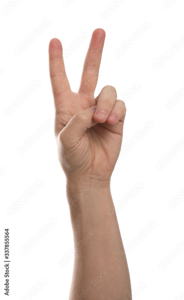 Man showing peace sign against white background, closeup of hand Man showing peace sign against white background, closeup of hand