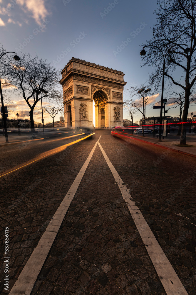 World famous Arc de Triomphe at the city center of Paris, France. World famous Arc de Triomphe at the city center of Paris, France.