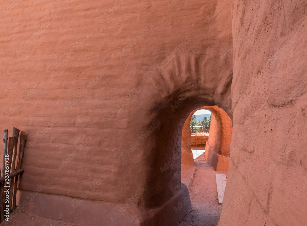 Passageway Through The Adobe Walls of The Spanish Mission Nuestra Señora de los Ángeles de Porciúncula de los Pecos, Pecos National Historical Park, New Mexico, USA
