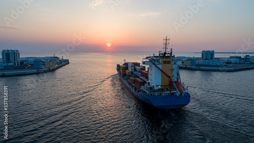 Tableau sur toile Aerial view at sunset of a cargo ship in the Gulf of Finland