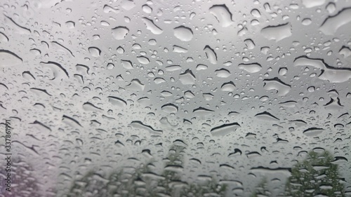 Droplets on glass in a rainy weather
