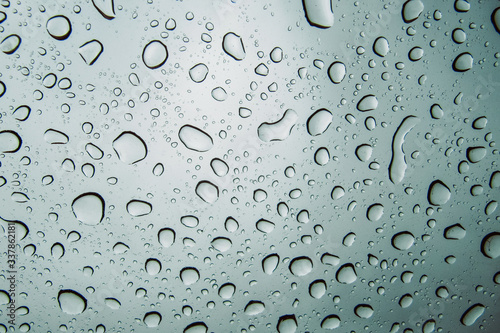 Droplets on glass in a rainy weather