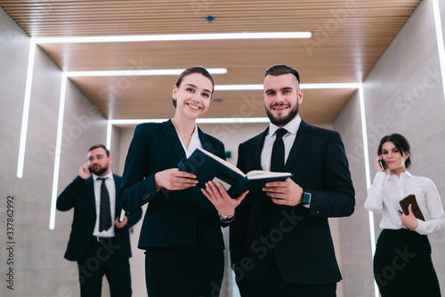 Cheerful business partners closing deal