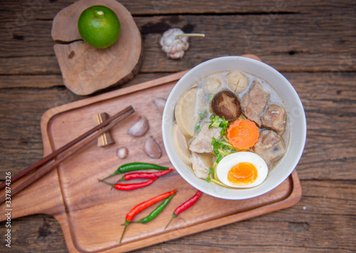 Chinese homemade pork soup noodle with egg, mushroom, pork balls, chilli, garlic , very yummy.