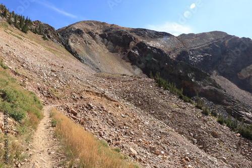 Mark Malu trail crosses from alpine grasslands to barren slopes of the Wasatch Mountains