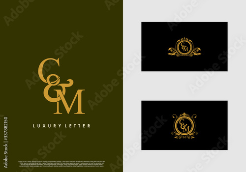 CM logo initial vector mark. Gold color elegant classical symmetric curves decor.