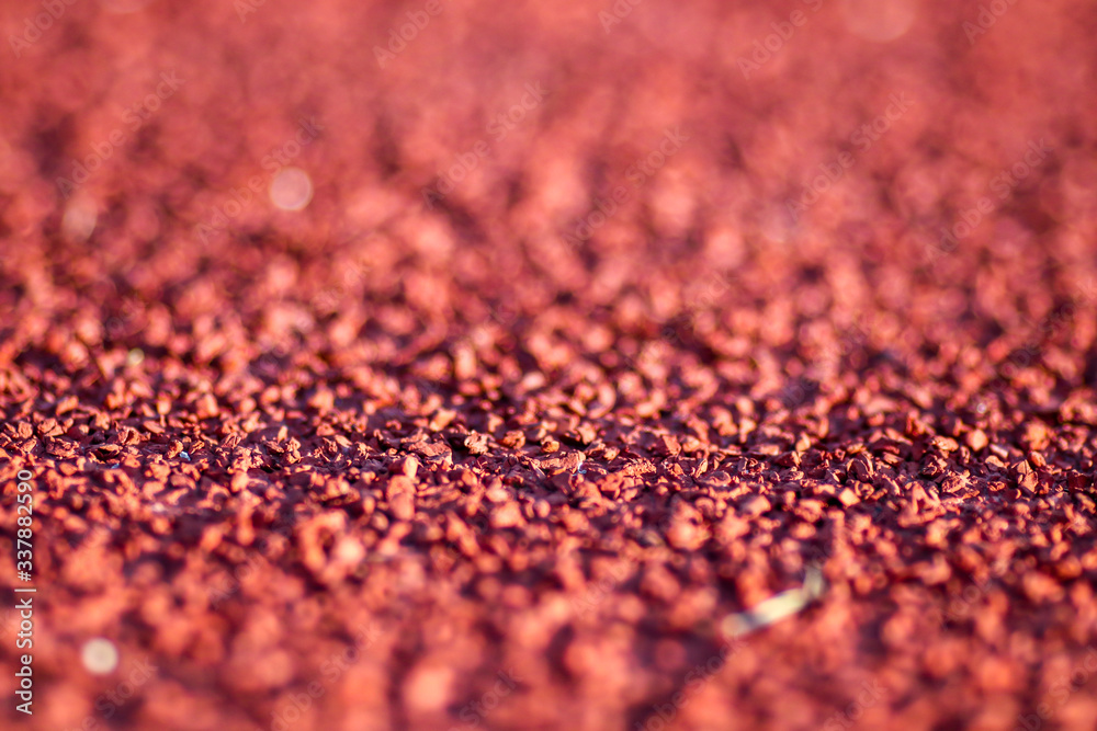 Red running sport track background and texture. Sport running track concept.