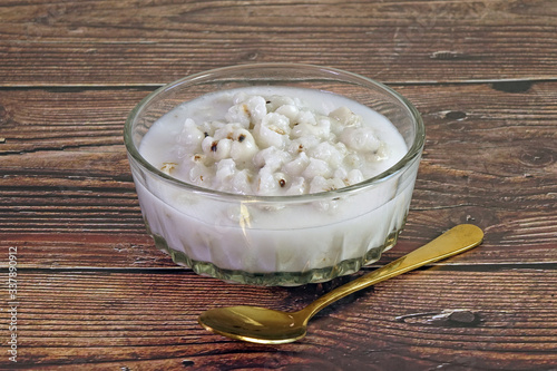 Job’s tear in coconut milk, Asian dessert. Job's tears also known as adlay or adlay millet, Chinese pearl barley, coixseed, tear grass and Yi Yi. Sweet and delicious dessert, Selective focus. photo