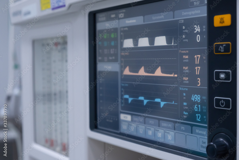 The Vital signs monitor in operating room in hospital. Vital signs monitor using for measure pulse oximetry, non-invasive blood pressure, temperature, EtCo2, respiration and etc. The Vital signs monitor in operating room in hospital. Vital signs monitor using for measure pulse oximetry, non-invasive blood pressure, temperature, EtCo2, respiration and etc.