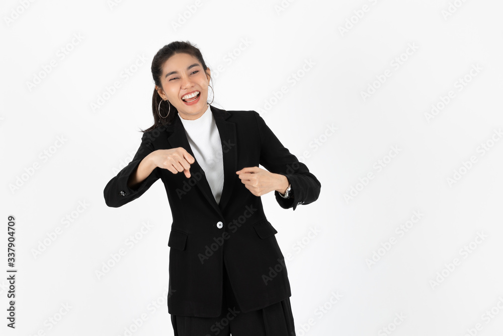 Cheerful young Asian business woman in suit smiling on white isolated background. Cheerful young Asian business woman in suit smiling on white isolated background.
