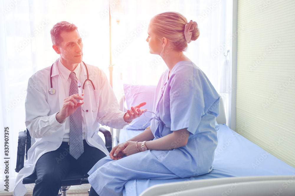 Professional doctor interview or talking with woman patient in hospital room or clinic, healthcare diagnosis disease concept Professional doctor interview or talking with woman patient in hospital room or clinic, healthcare diagnosis disease concept