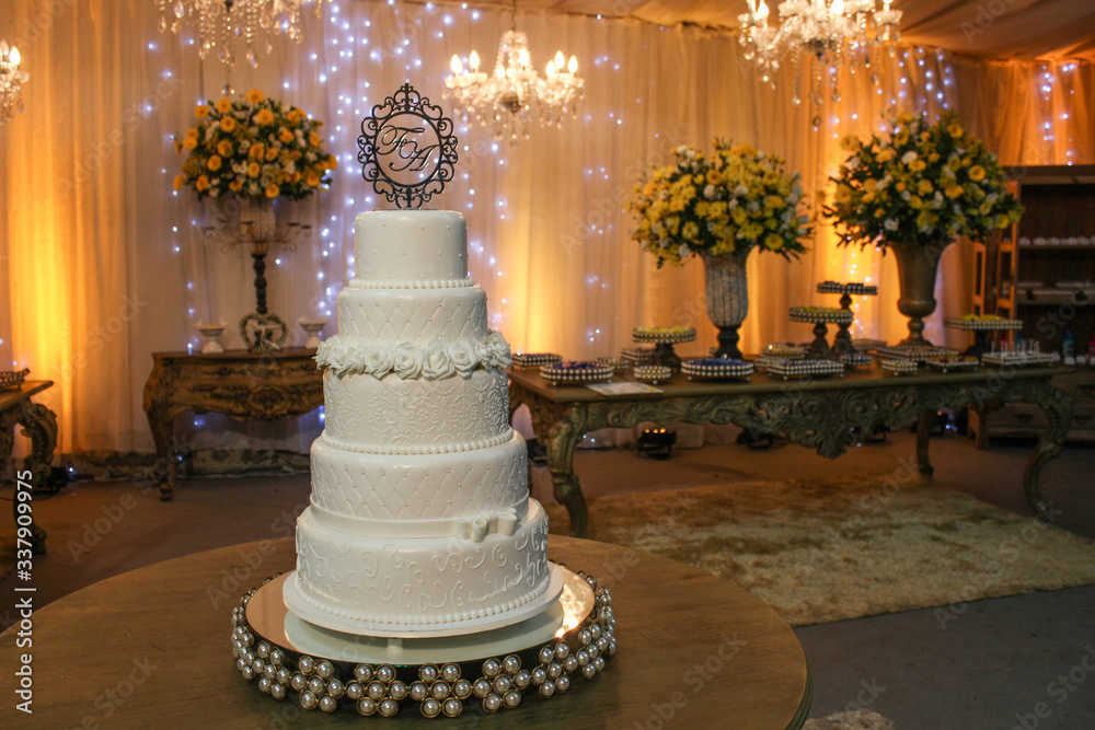 Wedding Setup. Cake table with decoration and flowers Wedding Setup. Cake table with decoration and flowers
