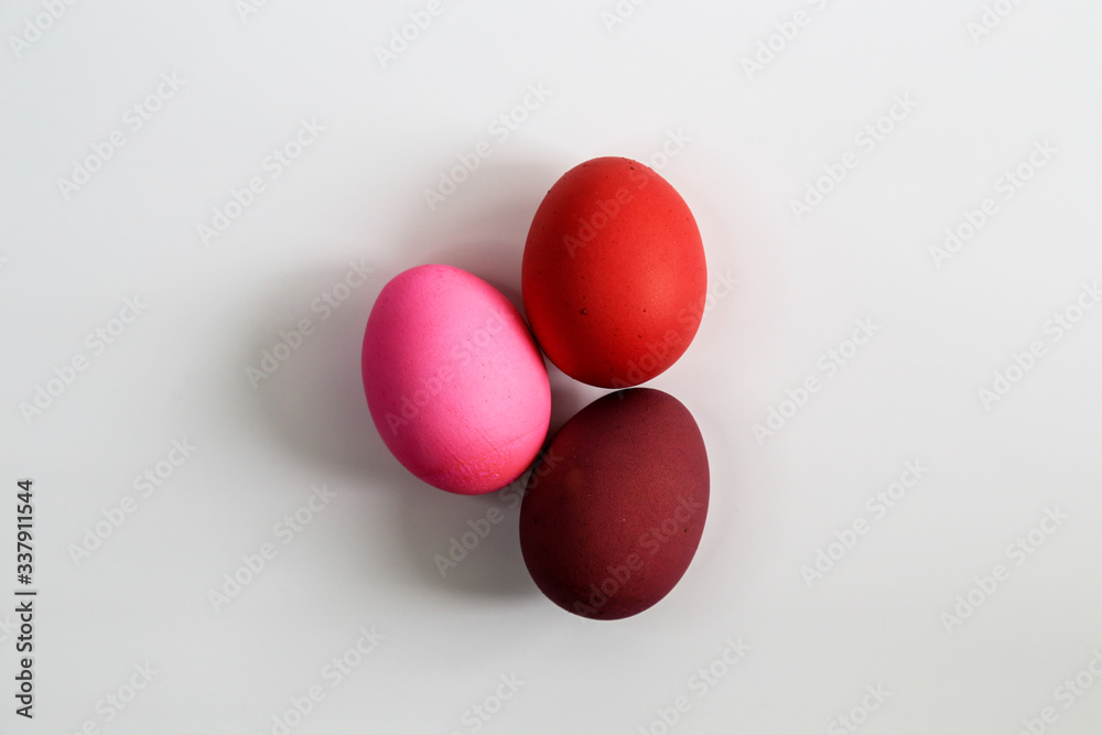 Easter eggs in red shades on a white background Easter eggs in red shades on a white background