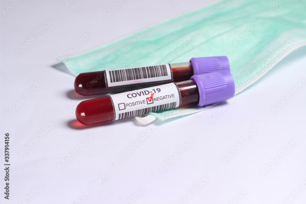 Close Up Photo, Simple Conceptual, Glass Blood Covid-19 Test tube, negative result, above N95 Surgical Mask
Close Up Photo, Simple Conceptual, Glass Blood Covid-19 Test tube, negative result, above N95 Surgical Mask