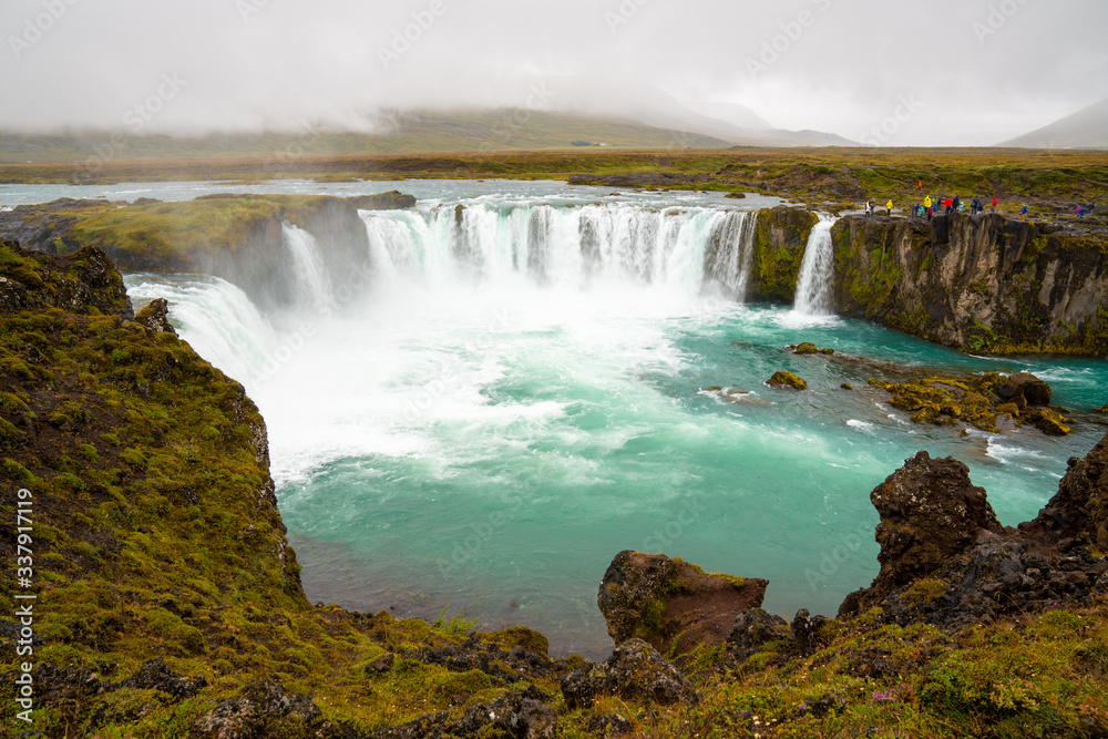 The Godafoss Icelandic: Goðafoss waterfall of the gods, is a famous waterfall in Iceland. The Godafoss Icelandic: Goðafoss waterfall of the gods, is a famous waterfall in Iceland.