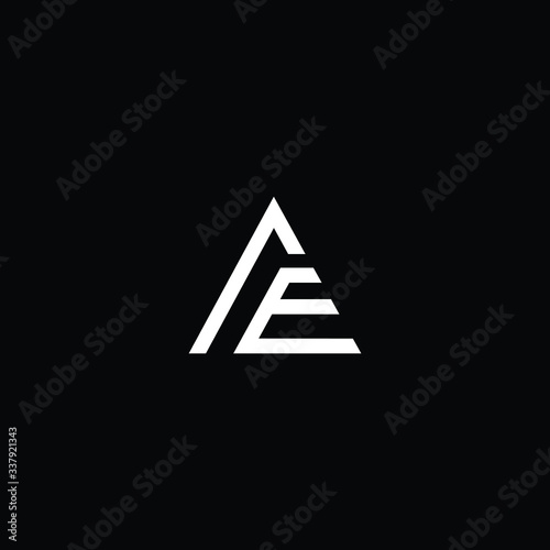 Minimal elegant monogram art logo. Outstanding professional trendy awesome artistic AE EA initial based Alphabet icon logo. Premium Business logo White color on black background photo