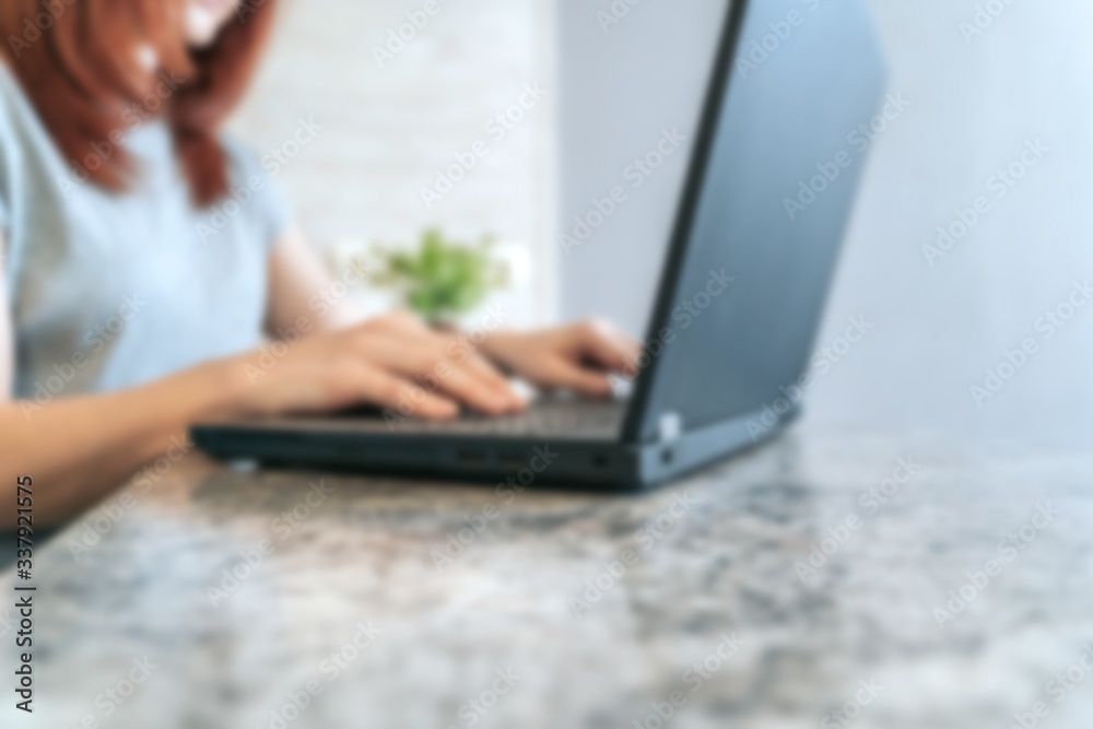 Close up of woman hands working with a laptop at home Close up of woman hands working with a laptop at home