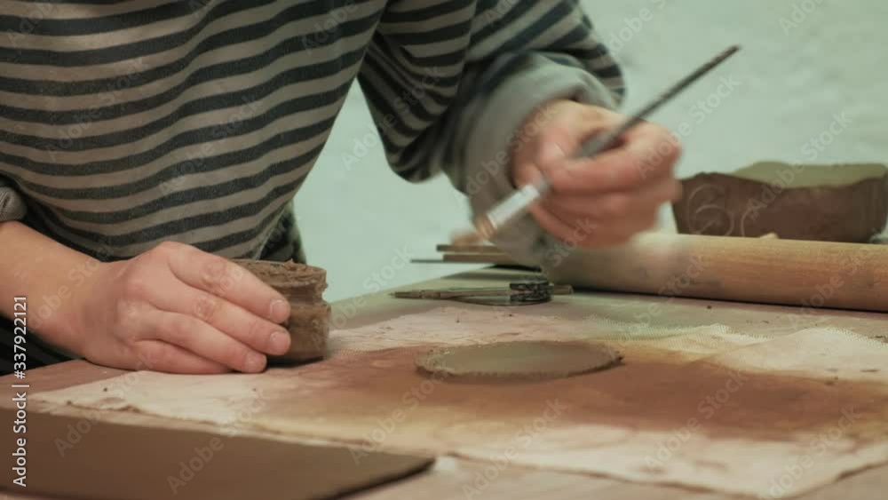 the work of a ceramist. making pottery the work of a ceramist. making pottery