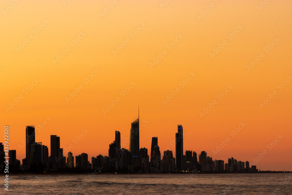 Golden Gold Coast skyline silhouette at sunset Australia