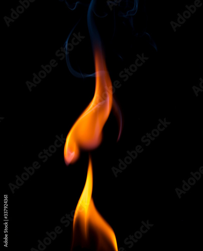 The movement of smoke and flame on a black background, abstract smoke background on a black background