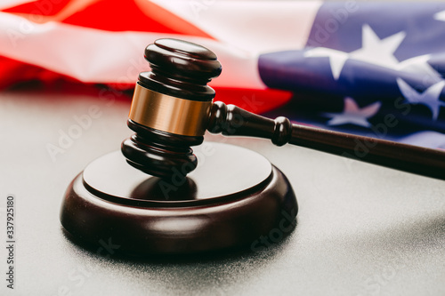 law gavel and USA america flag - American crime concept